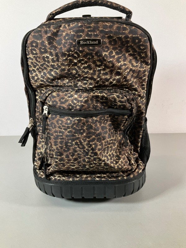 Fox Luggage Leopard 19in Rolling Backpack with Laptop Compartment and Adjustable