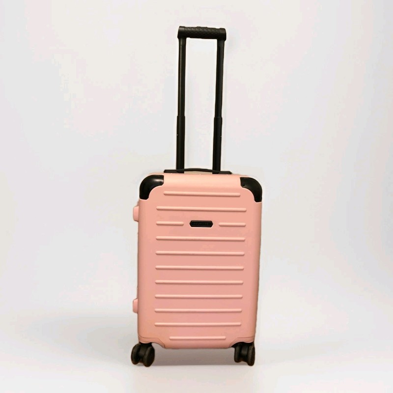 Solgaard Light Pink Rolling Suitcase with Carry On Closet USB Charging Port
