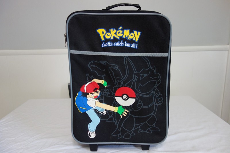 Pokemon Gotta Catch ‘Em All! Rolling Suitcase Ash Throwing Pokeball Charizard