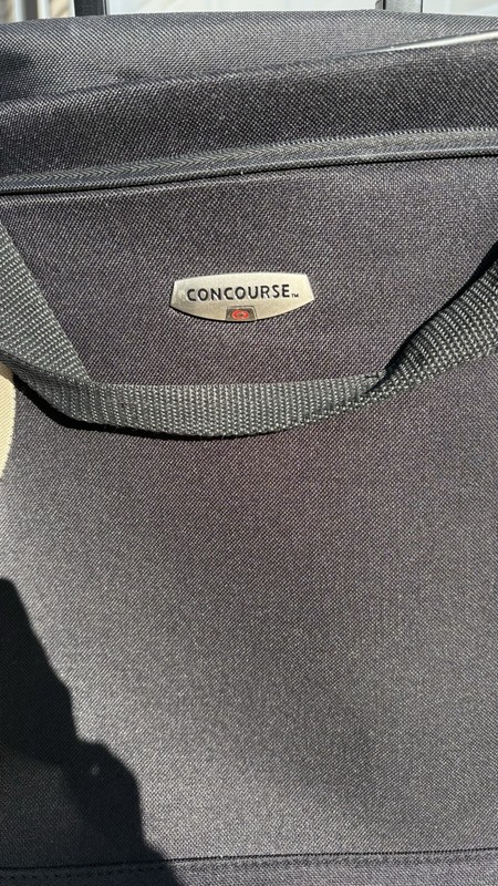 Concourse Black/Beige Solid Carry-On Rolling Duffel Bag Retractable Handle gallery