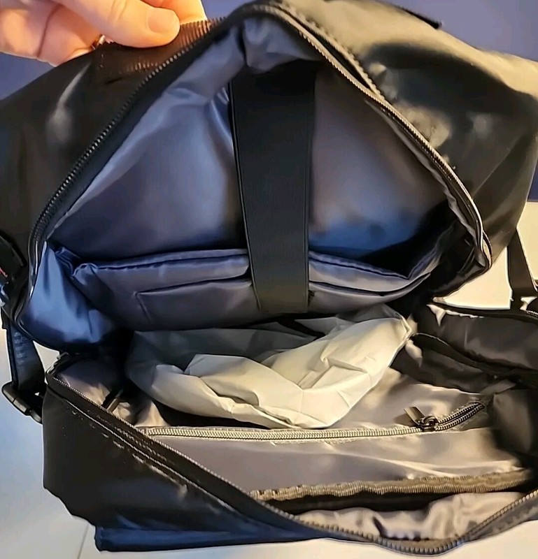 Travel backpack with multiple compartments and carrying options, black gallery
