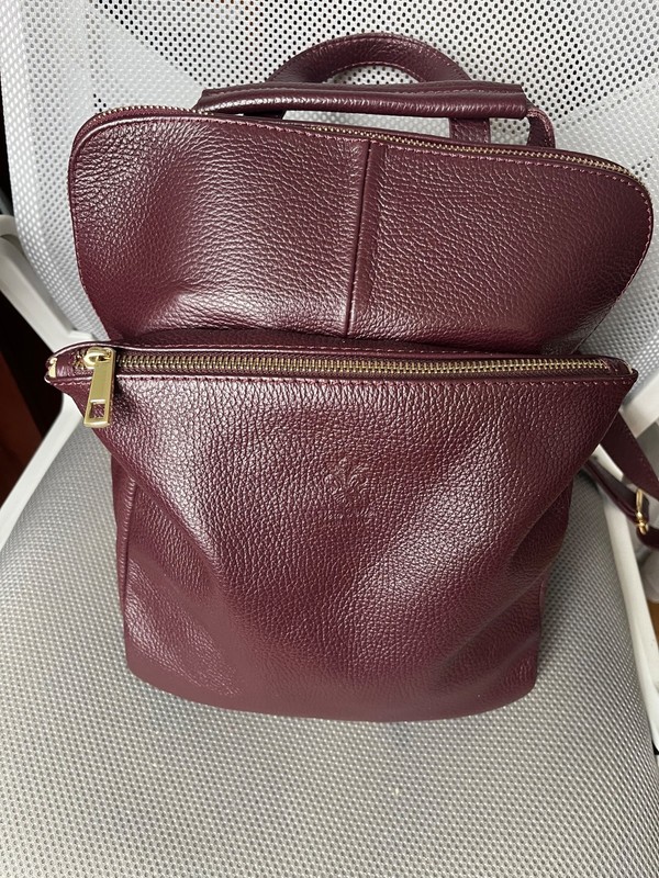 Leather dark cherry backup bag. Made in Italy. Good for travel.