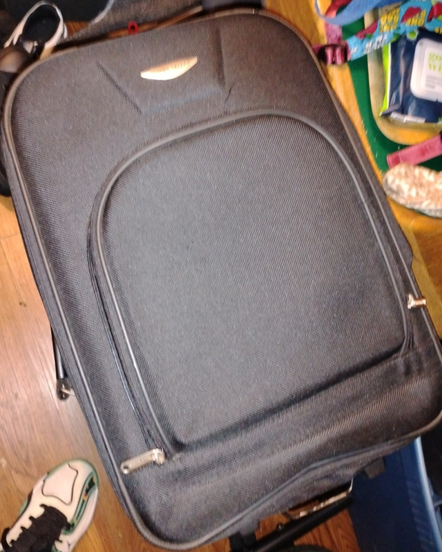 Travel Select Black Expandable Rolling Carry-On Upright Polyester Suitcase