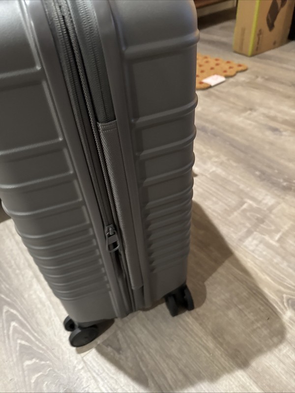 NEW In Box Beis Regular Carry-On Roller Charcoal 22" $268 MSRP. gallery