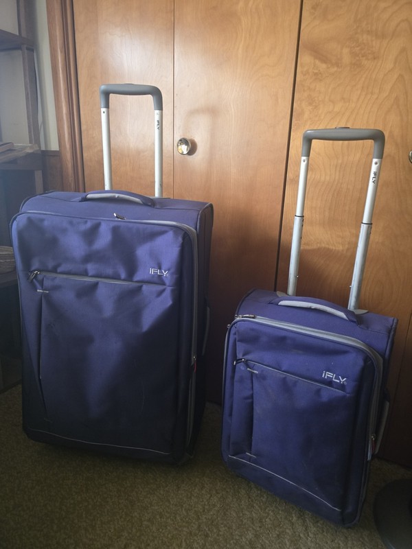iFly Purple Suitcase Set 2 Piece 28 Checked Bag & 20 Carry-on Spinner Wheels TSA