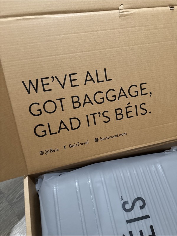 NEW In Box Beis Regular Carry-On Roller Charcoal 22" $268 MSRP. gallery
