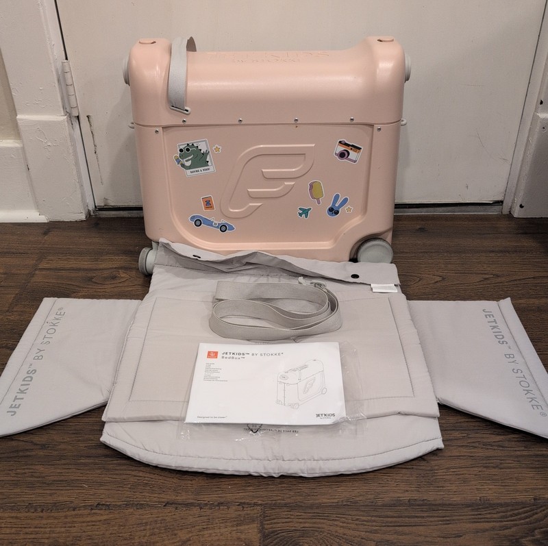 JetKids by Stokke Pink BedBox Ride-On Carry-On Suitcase & In-Flight Bed