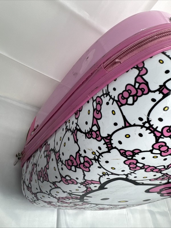 Hello Kitty Sanrio Hard Shell Rolling Carry On Luggage 18” All Over Kitty Print gallery