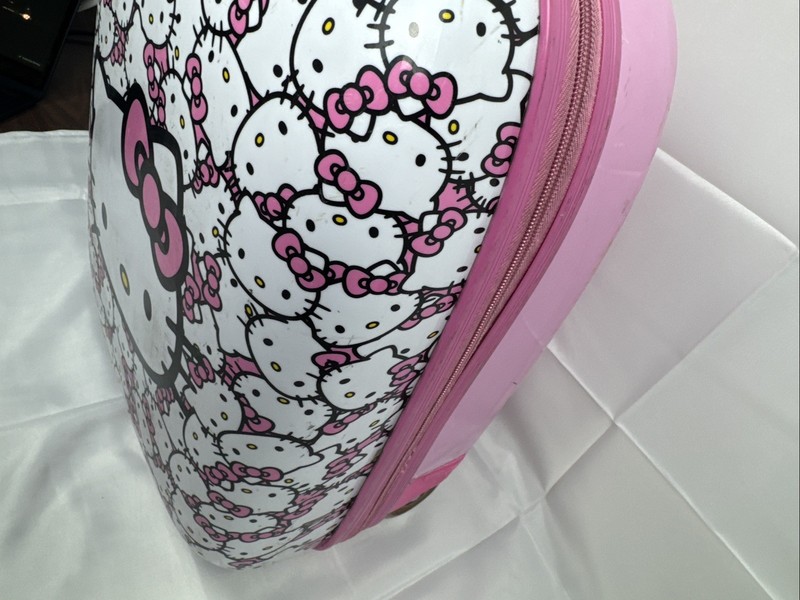 Hello Kitty Sanrio Hard Shell Rolling Carry On Luggage 18” All Over Kitty Print gallery
