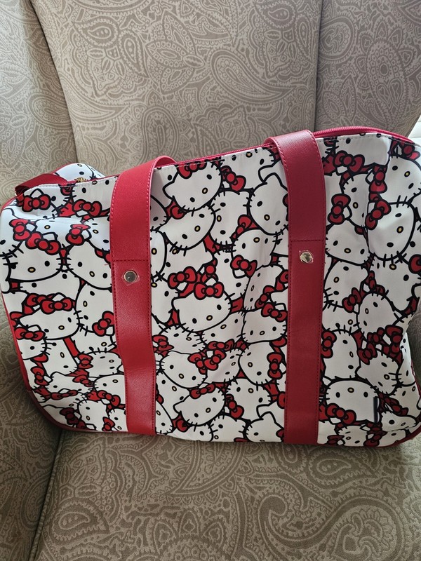 NEW Hello Kitty All-Over Print Rolling Duffle Bag