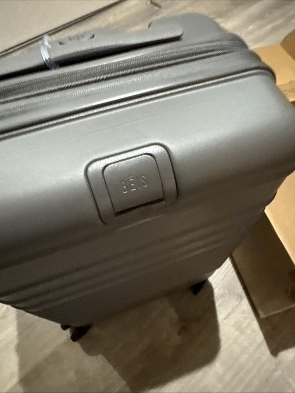 NEW In Box Beis Regular Carry-On Roller Charcoal 22" $268 MSRP. gallery