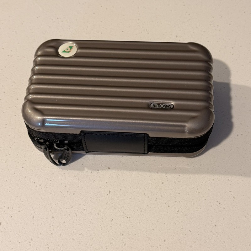 Rimowa First Class Hard Shell Amenity Mini Metallic 7″ Case