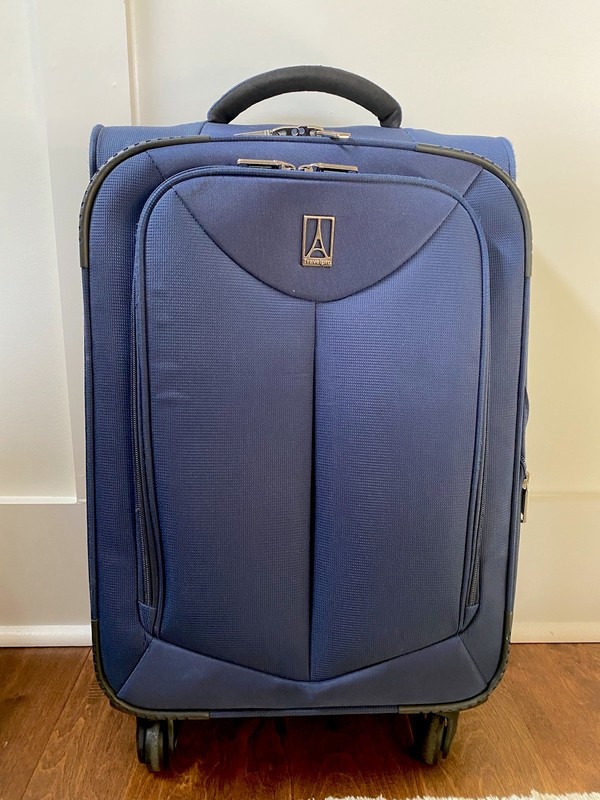 Travelpro Tourlite Softside Expandable Upright 4 Wheel Spinner Luggage