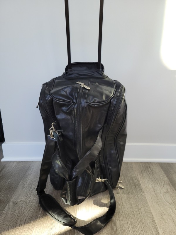 Black Leather (Synthetic) Roller Carry On Bag With Shoulder Strap