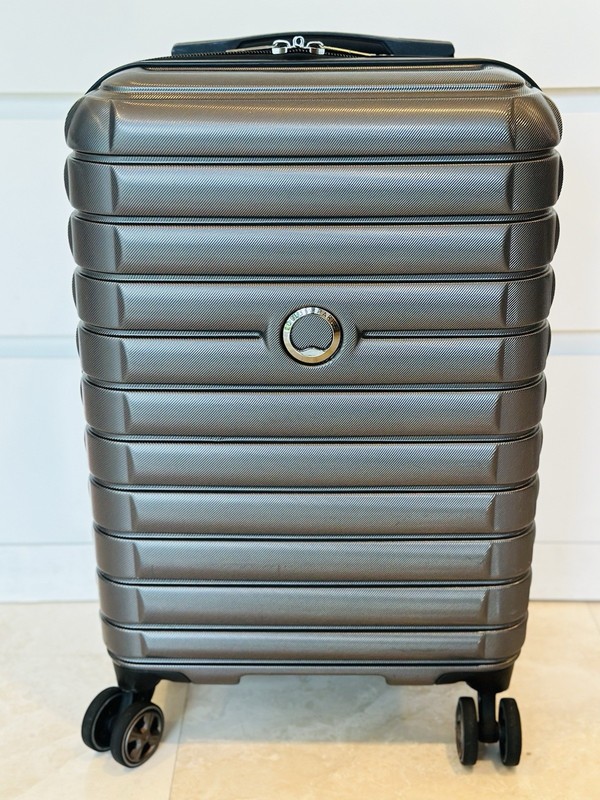 Delsey 22″ Grey Spinner Carry-On Hard Side