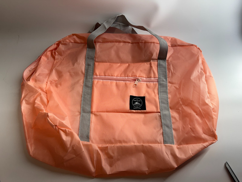 WIND BLOWS RIVER FLOWS Walking in the Air Travel Bag Folding Light Peach NWOT