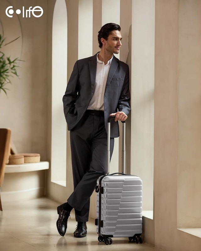 Durable 20 Inch Silver Carry On with TSA Lock, Four Spinner Wheels & Pockets gallery