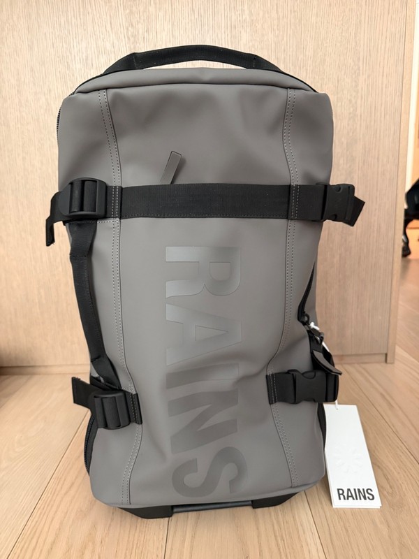 RAINS soft carry on; 2 wheels; gray, waterproof; 21.7x 7.9 x 12.2in