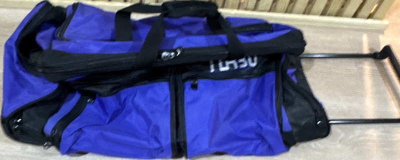 TUR30 Blue/Black Solid Polyester Rolling Duffle Bag 30″ with Wheels Handle