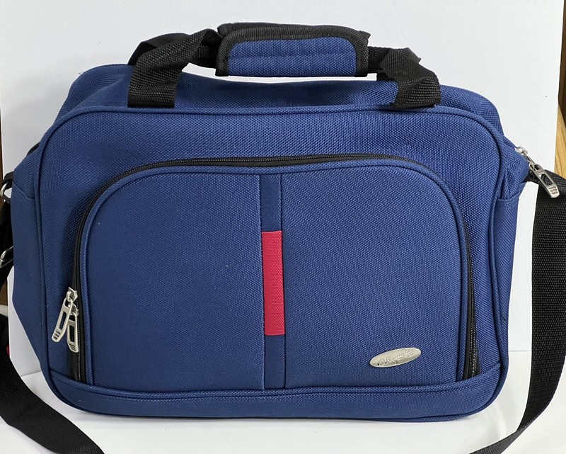 Olympia USA Cute Beautiful Blue Trolley Sleeve Duffle Bag. 11” By 6” By 15”.