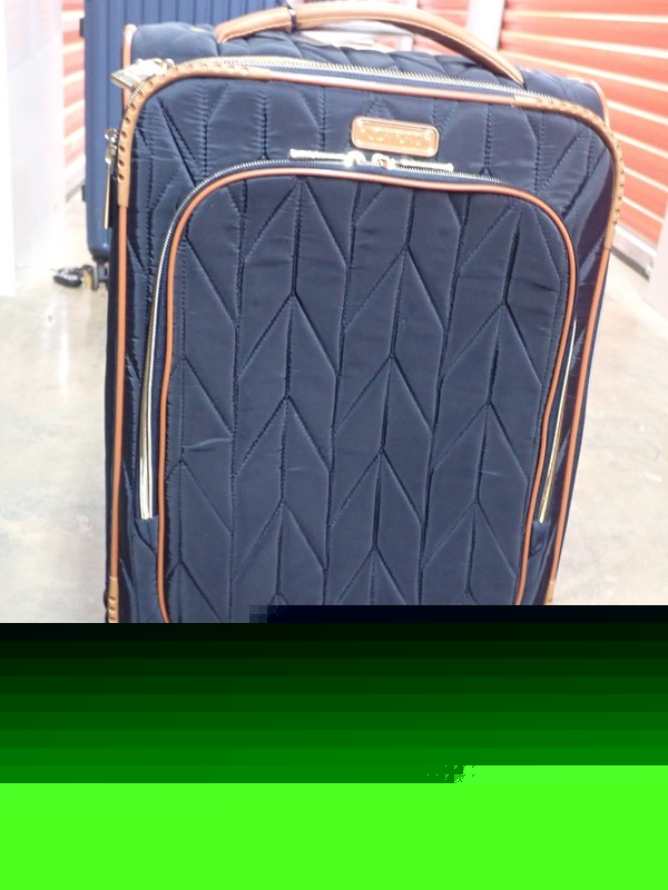 Joan & David suitcase with wheels