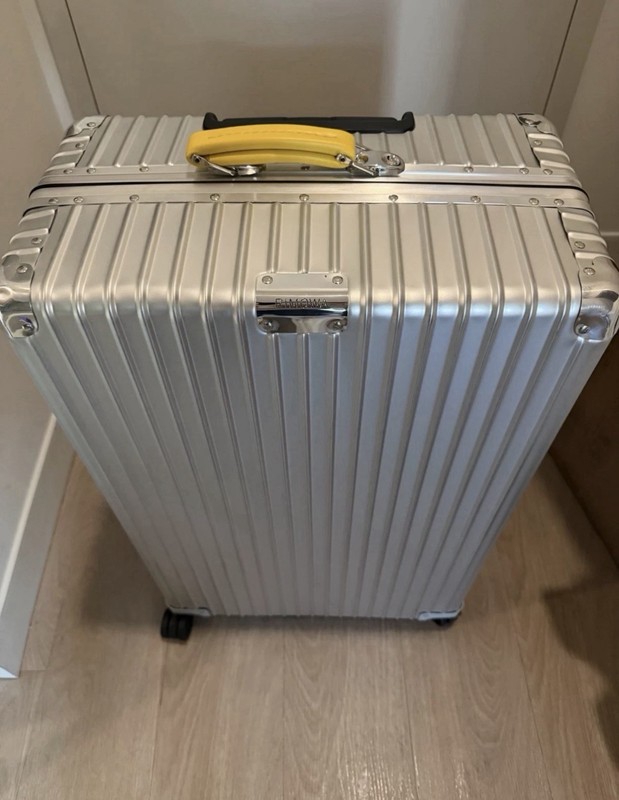 EXCELLENT RIMOWA LARGE CHECKED IN WITH YELLOW TAGS AND HANDLES