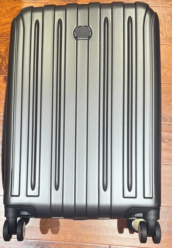 DELSEY PARIS Titanium Hardside Expandable Carry-On 21″ Spinner Luggage Graphite