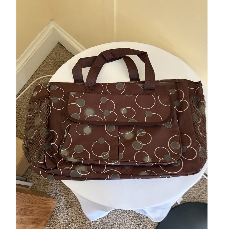 Brown Circle Pattern Travel Accessory Bag with Shoulder Strap & Exterior Pockets