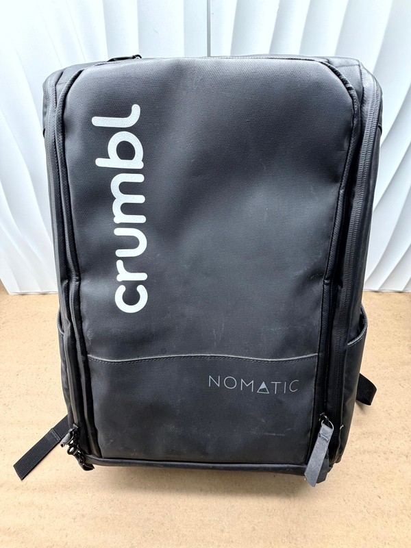 NOMATIC x Crumbl Cookies Backpack Black Expandable Laptop Bag RARE Branded VGC