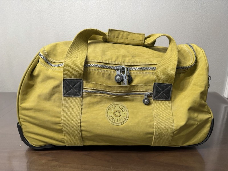 Kipling Darcey 22″ Soft Shell Carry-On Rolling Luggage Yellow Mustard