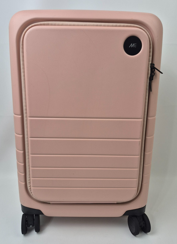 Monos Pink 23-Inch Pro Plus Front Pocket Spinner Carry-On Luggage
