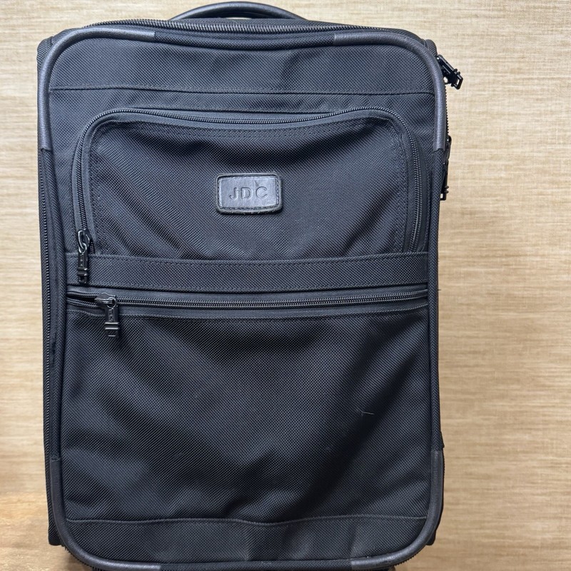 TUMi Black Rolling Luggage Suitcase - Model Unknown