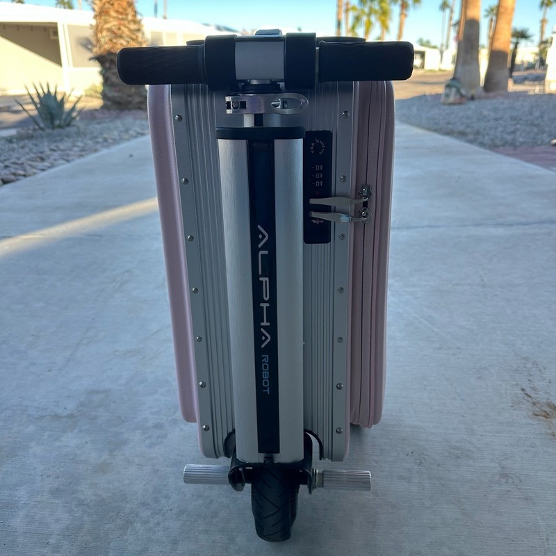 Alpha Robot Smart Rideable Motorized Locking Suitcase Light Pink With Charger gallery