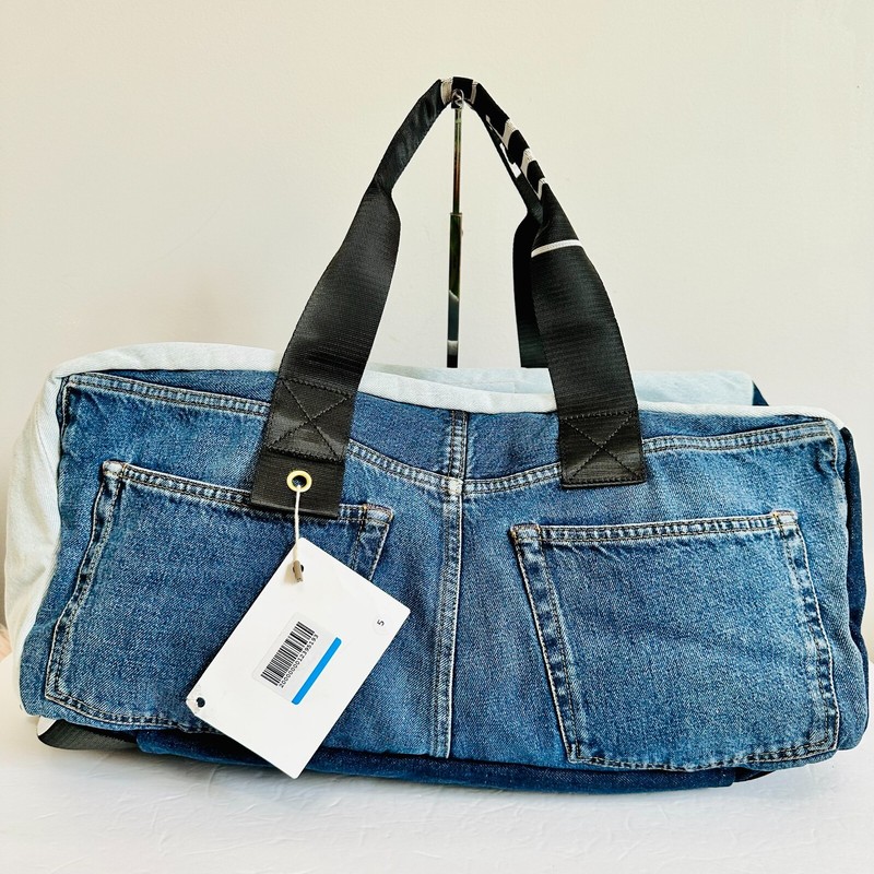 ACME STUDIOS CONVERTIBLE PATCHWORK DENIM DUFFLE TRAVEL BAG