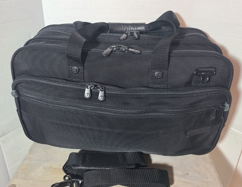 Briggs and Riley Baseline Series 21 Inch 3 Zip Carry On Luggage. Style 1138.